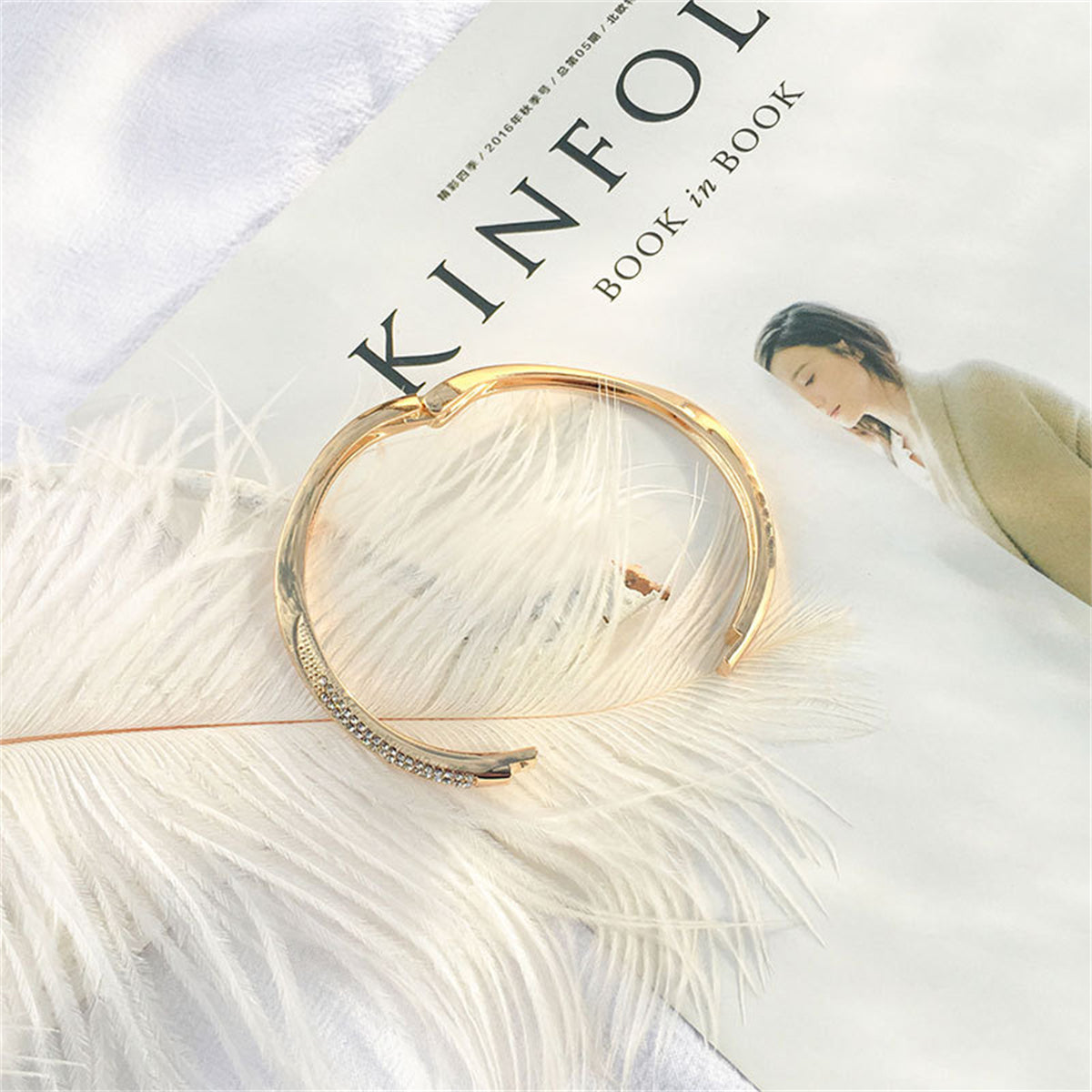 Cubic Zirconia and 18K Gold-Plated Twisted Bangle, gold bangle bracelet, botanical inspired, lifestyle look