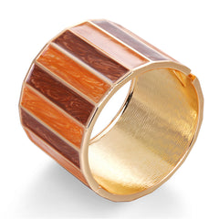 Brown and orange striped cuff bracelet with orange enamel and 18K gold plating, showcasing a stylish bangle design.