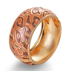 An elegant gold and brown bangle with a decorative pattern, made of brown enamel and 18K gold plating.