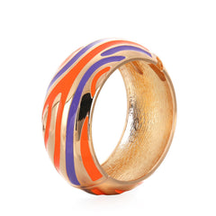 A striking orange and blue striped bracelet adorned with gold accents, highlighting its elegant 18K gold-plated stripes.