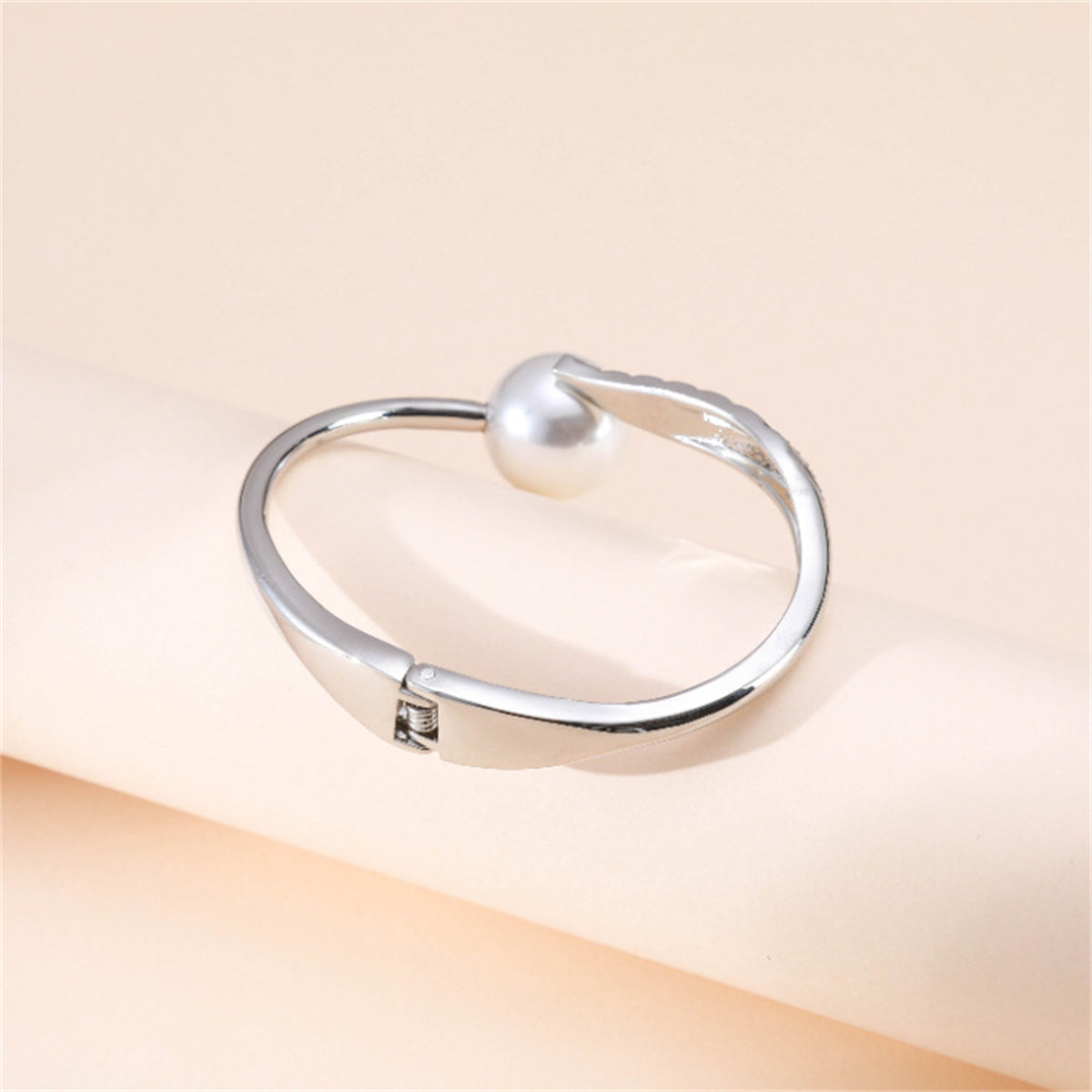 White Pearl & Cubic Zirconia Silver-Plated Leaf Hinge Bangle