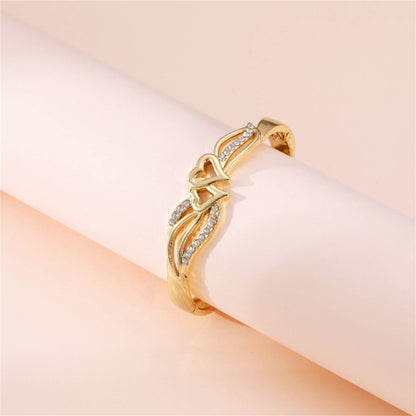 Cubic Zirconia and 18K Gold-Plated Leaves Stacked Heart Hinge Bangle, gold bangle bracelet, detail close-up
