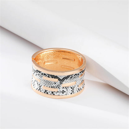 Polystyrene and 18K Gold-Plated Serpentine Bangle, gold bangle bracelet, everyday style, lifestyle look