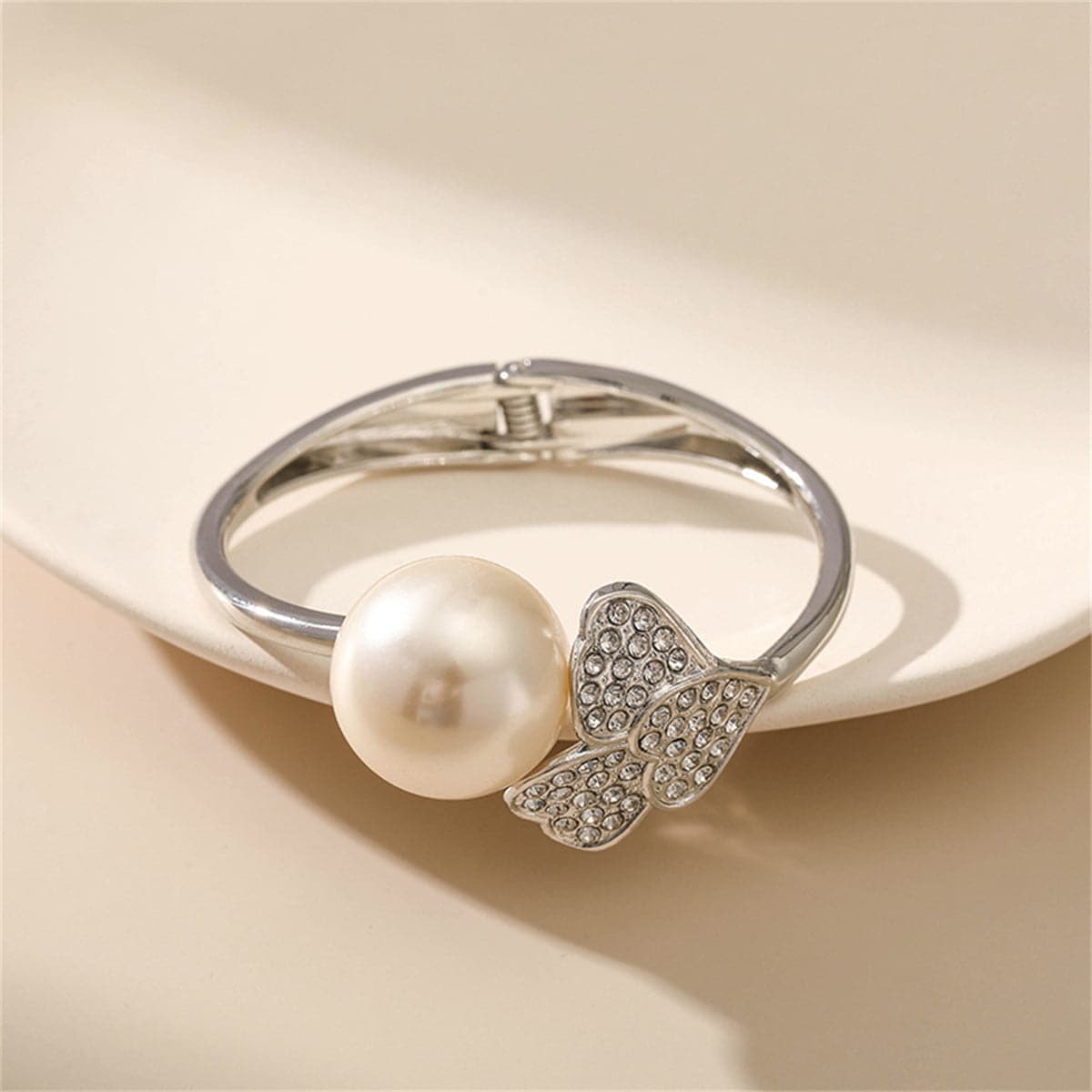 Pearl and Cubic Zirconia Silver-Plated Round Heart Bangle, silver bangle bracelet, dainty minimalist design, detail close-up