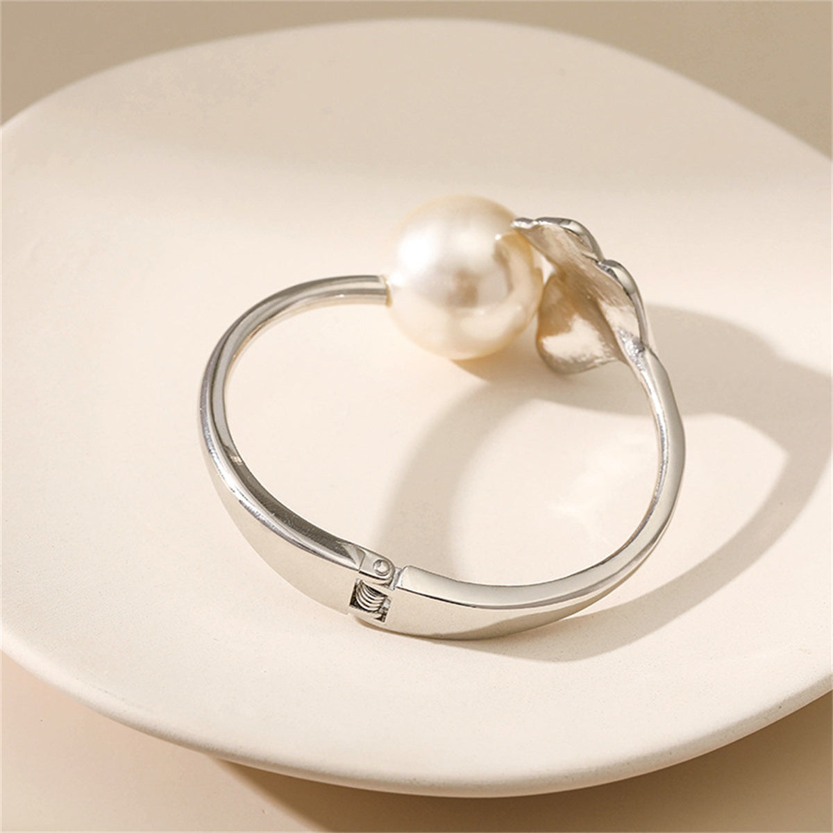 Pearl and Cubic Zirconia Silver-Plated Round Heart Bangle, silver bangle bracelet, dainty minimalist design, lifestyle look