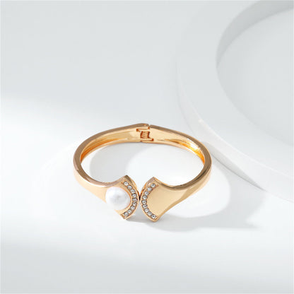 Pearl and Cubic Zirconia 18K Gold-Plated Fan Hinge Bangle, gold bangle bracelet, vintage-inspired design, side view