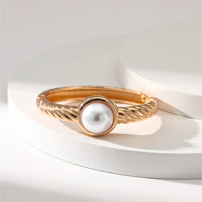 Pearl and 18K Gold-Plated Twine Bangle, gold bangle bracelet, vintage-inspired design, side view
