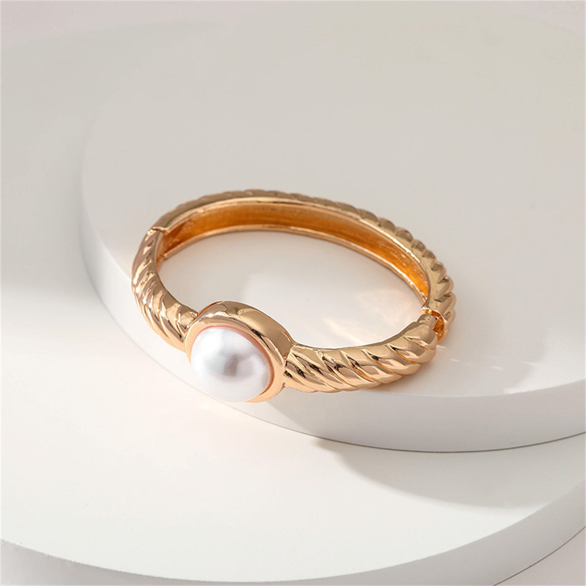 Pearl and 18K Gold-Plated Twine Bangle, gold bangle bracelet, vintage-inspired design, detail close-up