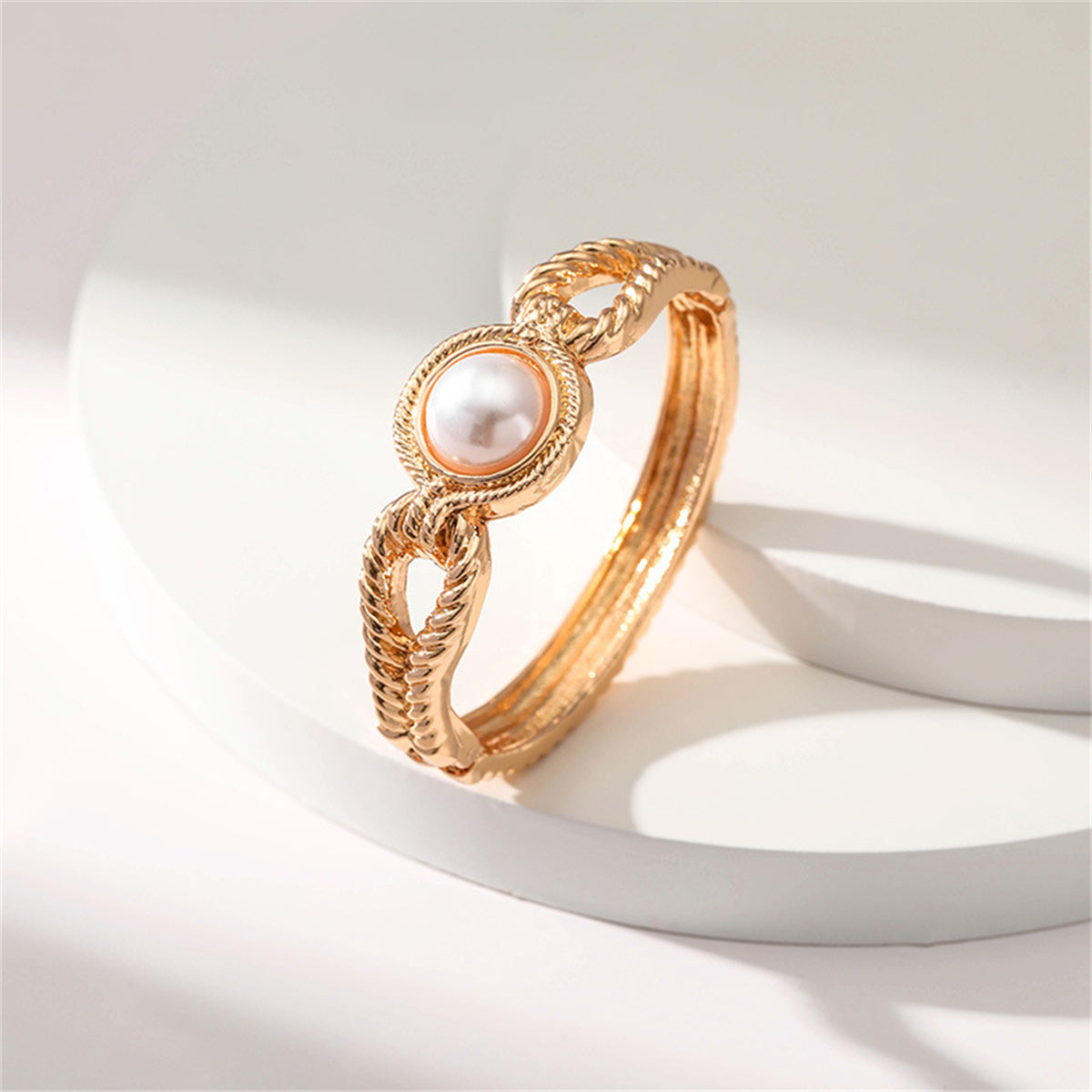Pearl and 18K Gold-Plated Wing Bangle, gold bangle bracelet, vintage-inspired design, lifestyle look