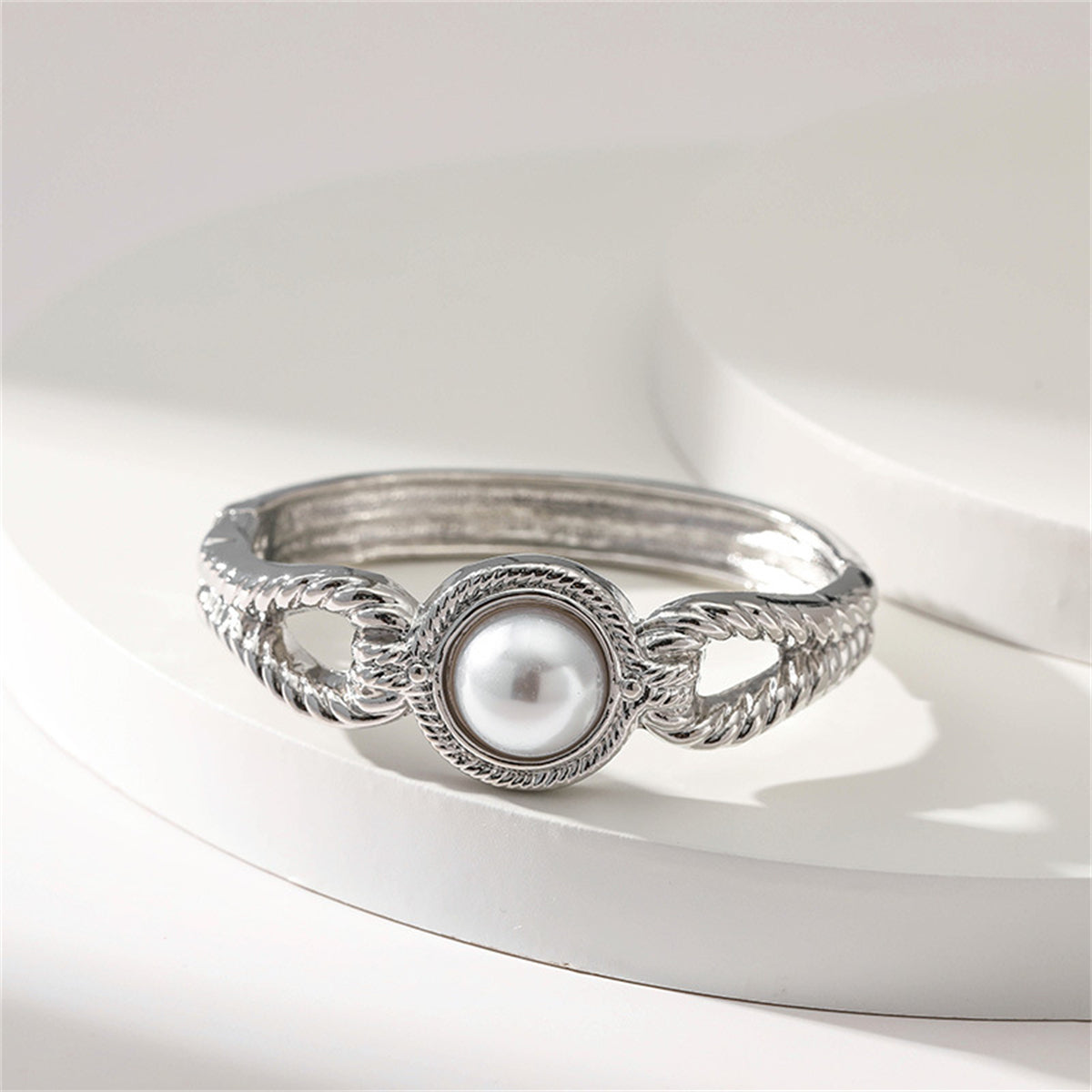 Pearl and Silver-Plated Wing Bangle, silver bangle bracelet, vintage-inspired design, side view