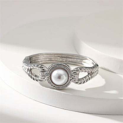 Pearl and Silver-Plated Wing Bangle, silver bangle bracelet, vintage-inspired design, side view