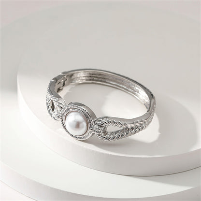 Pearl and Silver-Plated Wing Bangle, silver bangle bracelet, vintage-inspired design, styled look