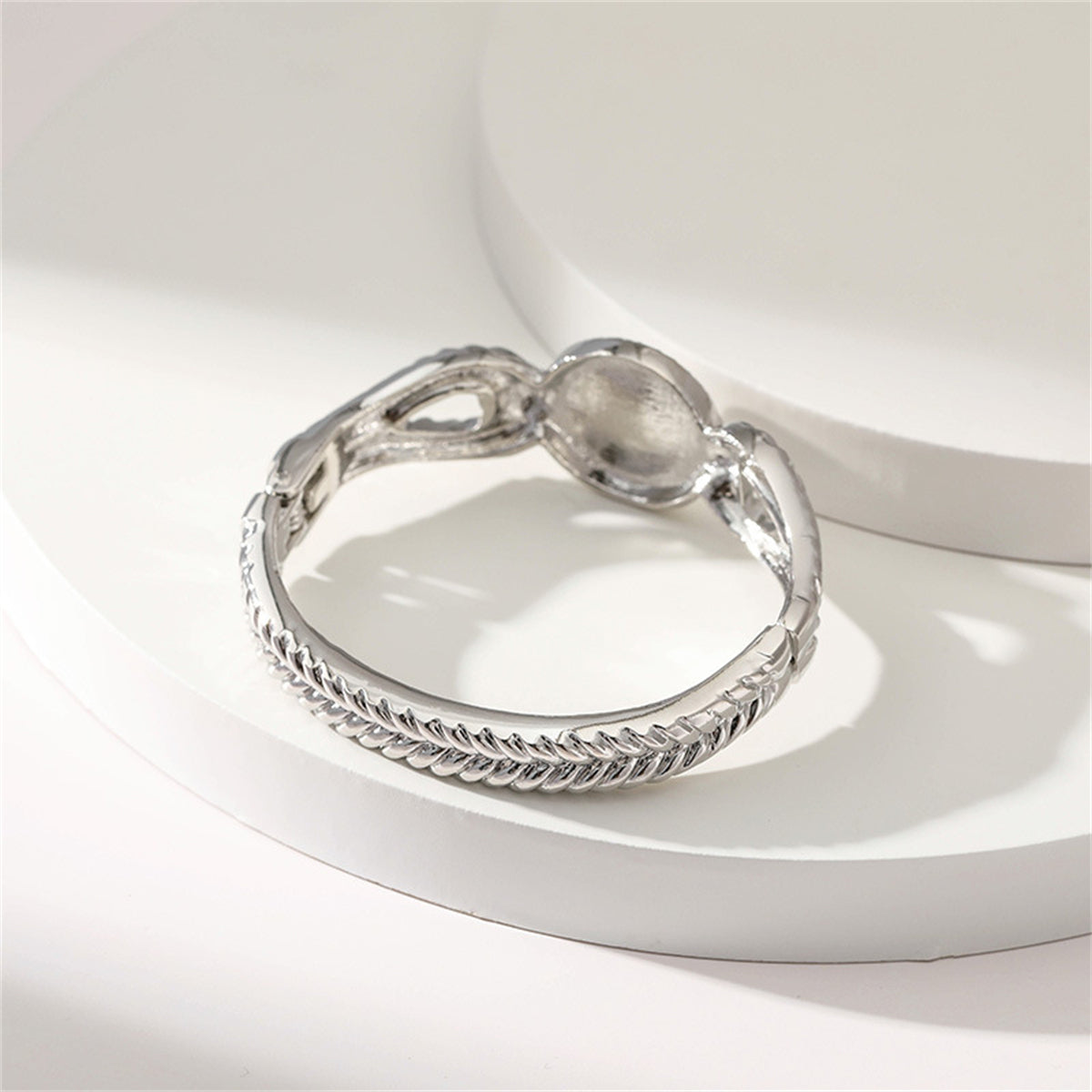 Pearl and Silver-Plated Wing Bangle, silver bangle bracelet, vintage-inspired design, detail close-up