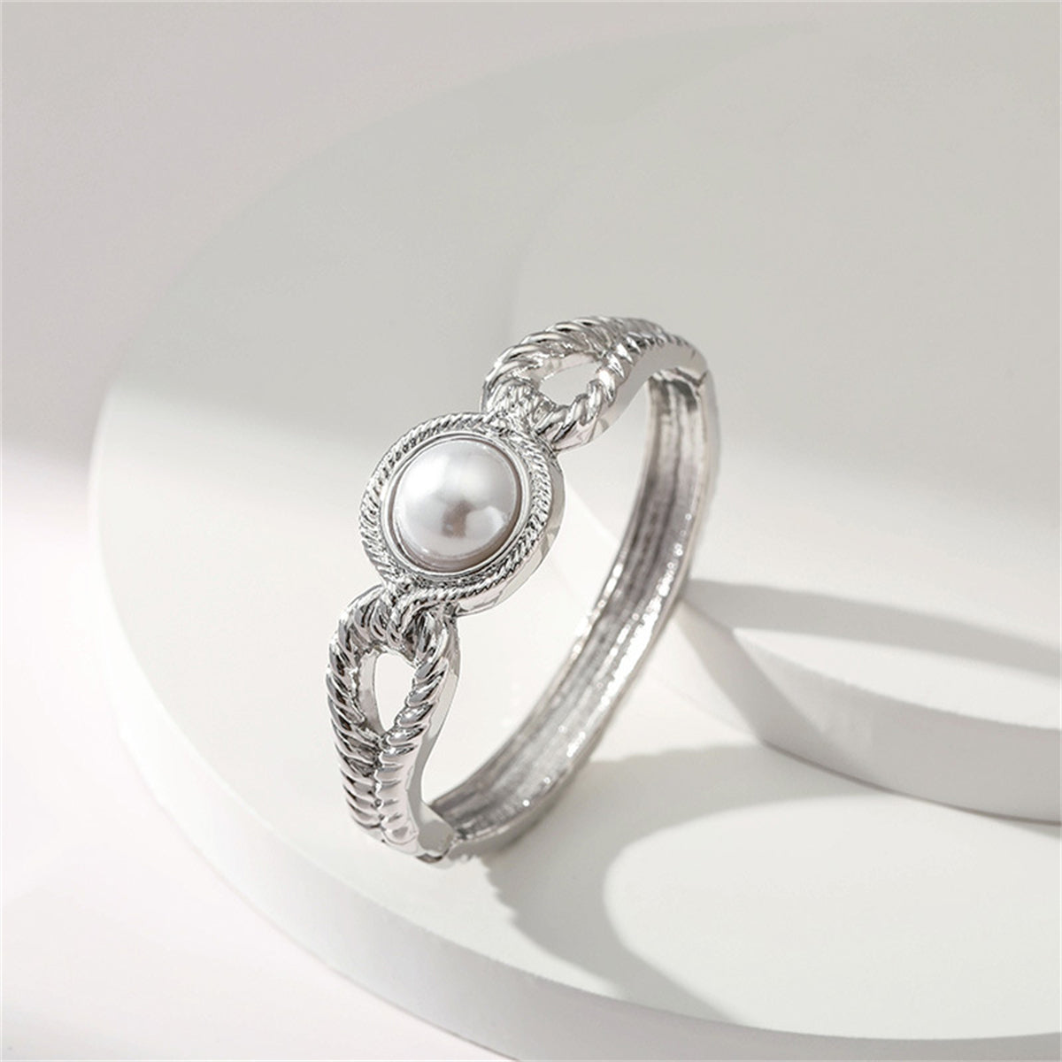 Pearl and Silver-Plated Wing Bangle, silver bangle bracelet, vintage-inspired design, lifestyle look