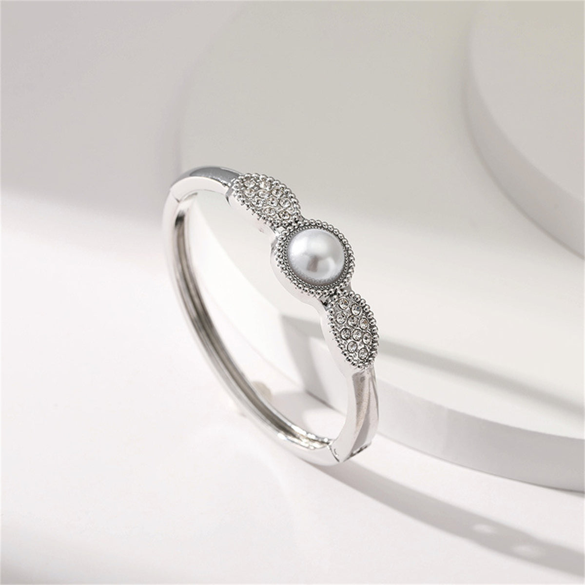 Pearl and Cubic Zirconia Silver-Plated Bangle, silver bangle bracelet, vintage-inspired design, detail close-up