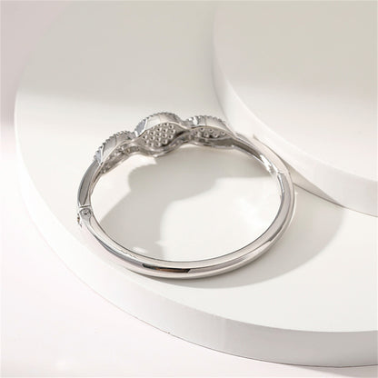 Pearl and Cubic Zirconia Silver-Plated Bangle, silver bangle bracelet, vintage-inspired design, lifestyle look