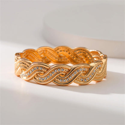 Cubic Zirconia and 18K Gold-Plated Twine Hinge Bangle, gold bangle bracelet, dainty minimalist design, detail close-up
