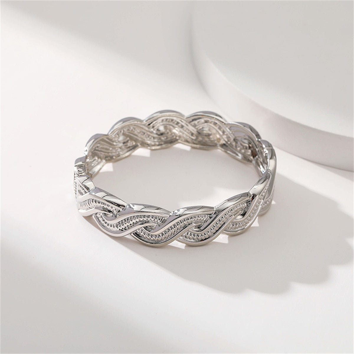 Cubic Zirconia and Silver-Plated Twine Hinge Bangle, silver bangle bracelet, botanical inspired, detail close-up