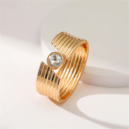 Crystal and 18K Gold-Plated Cut Bangle, gold bangle bracelet, dainty minimalist design, lifestyle look