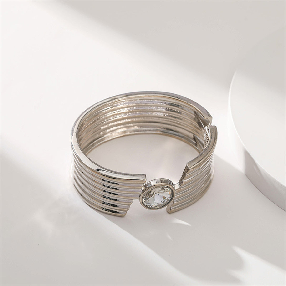 Crystal and Silver-Plated Cut Bangle, silver bangle bracelet, vintage-inspired design, detail close-up