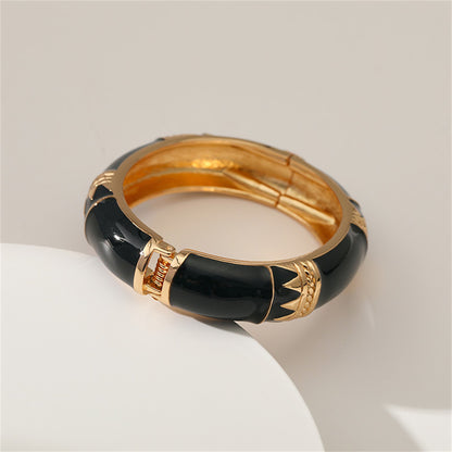 Black Enamel and 18K Gold-Plated Geometric Bamboo Bangle, gold bangle bracelet, everyday style, detail close-up
