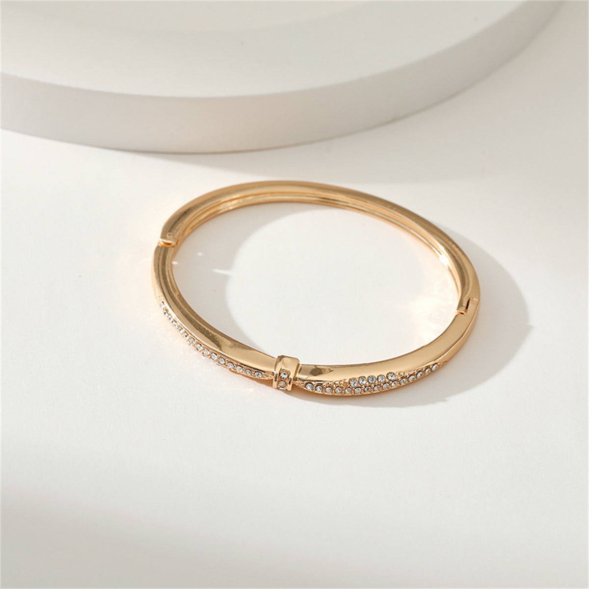 Cubic Zirconia and 18K Gold-Plated Knot Bangle, gold bangle bracelet, vintage-inspired design, styled look