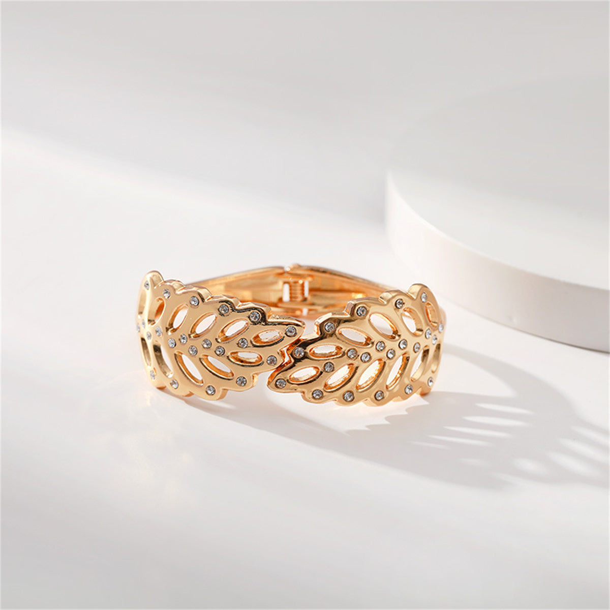 Cubic Zirconia and 18K Gold-Plated Rattan Hinged Bangle, gold bangle bracelet, botanical inspired, detail close-up