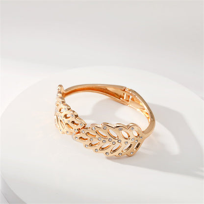 Cubic Zirconia and 18K Gold-Plated Rattan Hinged Bangle, gold bangle bracelet, botanical inspired, lifestyle look