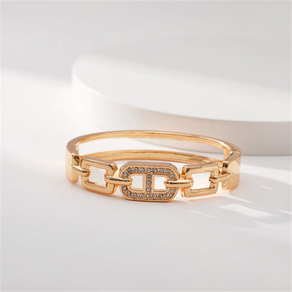 Clear Cubic Zirconia and 18K Gold-Plated Oval Charm Bangle, gold bangle bracelet, elegant gift for her, side view