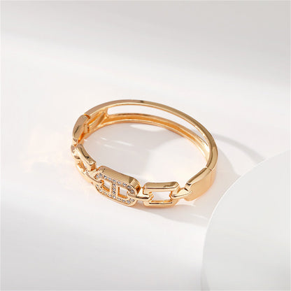 Clear Cubic Zirconia and 18K Gold-Plated Oval Charm Bangle, gold bangle bracelet, elegant gift for her, lifestyle look