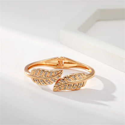 Clear Cubic Zirconia and 18K Gold-Plated Leaves Hinged Bypass Bangle, gold bangle bracelet, everyday style, side view