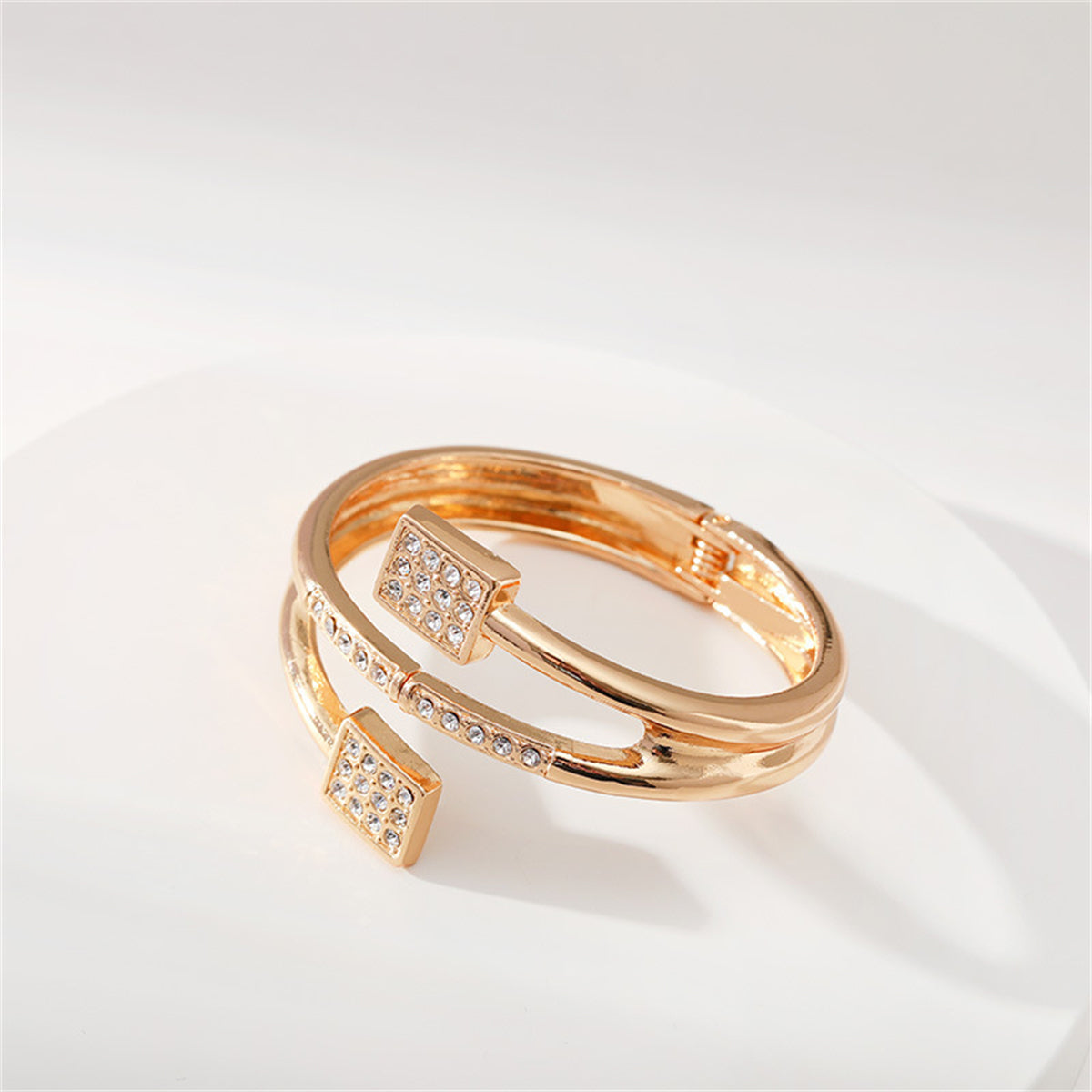 Clear Cubic Zirconia and 18K Gold-Plated Square Hinged Bypass Bangle, gold bangle bracelet, side view