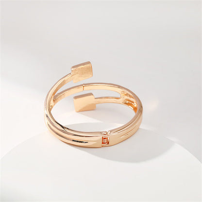 Clear Cubic Zirconia and 18K Gold-Plated Square Hinged Bypass Bangle, gold bangle bracelet, styled look