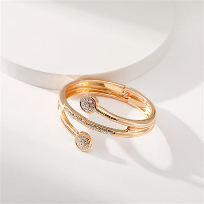 Clear Cubic Zirconia and 18K Gold-Plated Rattan Hinged Bypass Bangle, gold bangle bracelet, side view