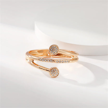 Clear Cubic Zirconia and 18K Gold-Plated Rattan Hinged Bypass Bangle, gold bangle bracelet, detail close-up