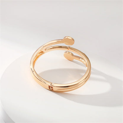 Clear Cubic Zirconia and 18K Gold-Plated Rattan Hinged Bypass Bangle, gold bangle bracelet, styled look