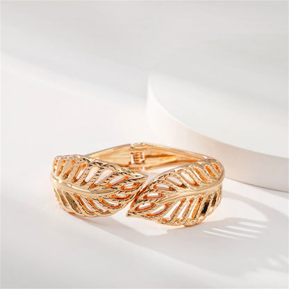 18K Gold-Plated Leaves Hinged Bypass Bangle, gold bangle bracelet, vintage-inspired design, lifestyle look