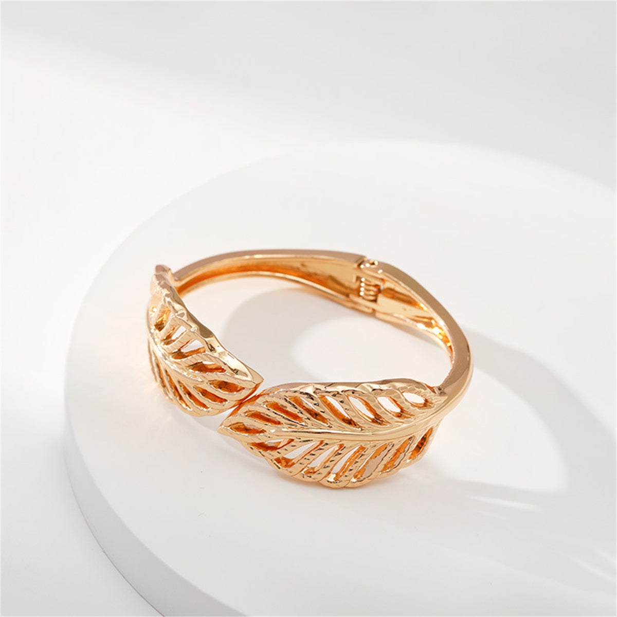 18K Gold-Plated Leaves Hinged Bypass Bangle, gold bangle bracelet, vintage-inspired design, detail close-up