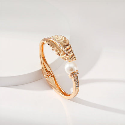 Pearl and Cubic Zirconia Leaf Hinged Bangle, bangle bracelet, dainty minimalist design, side view