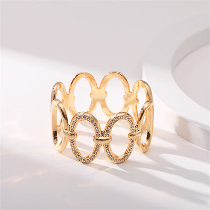 Clear Cubic Zirconia and 18K Gold-Plated Oval Station Bangle, gold bangle bracelet, botanical inspired, detail close-up