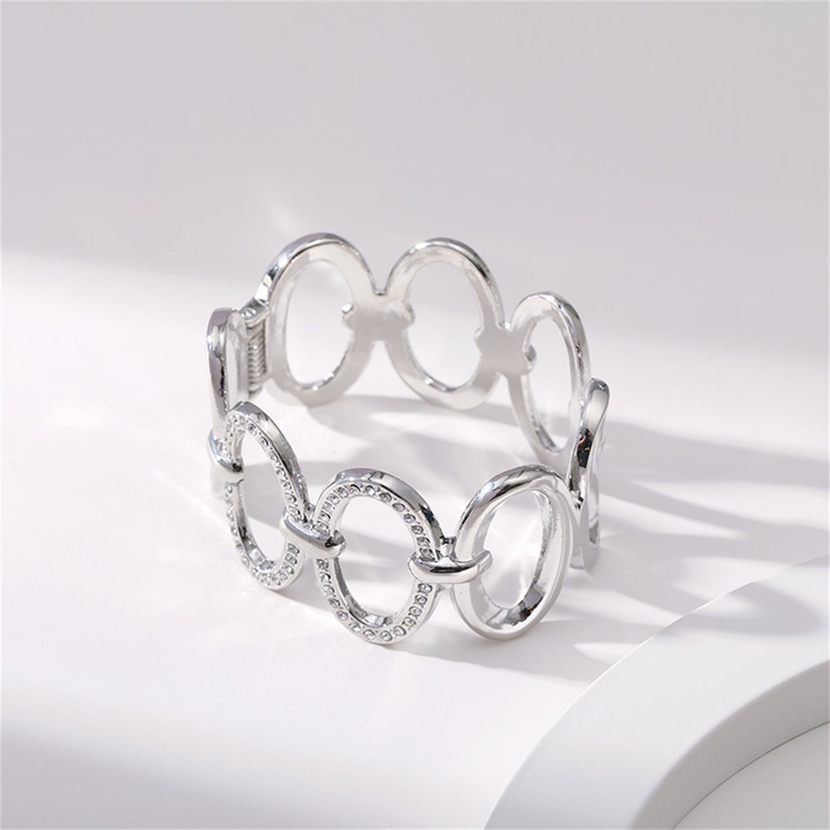 Cubic Zirconia and Silver-Plated Oval Station Bangle, silver bangle bracelet, botanical inspired, side view