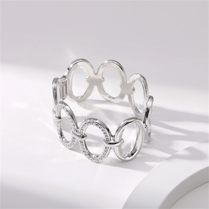 Cubic Zirconia and Silver-Plated Oval Station Bangle, silver bangle bracelet, botanical inspired, side view