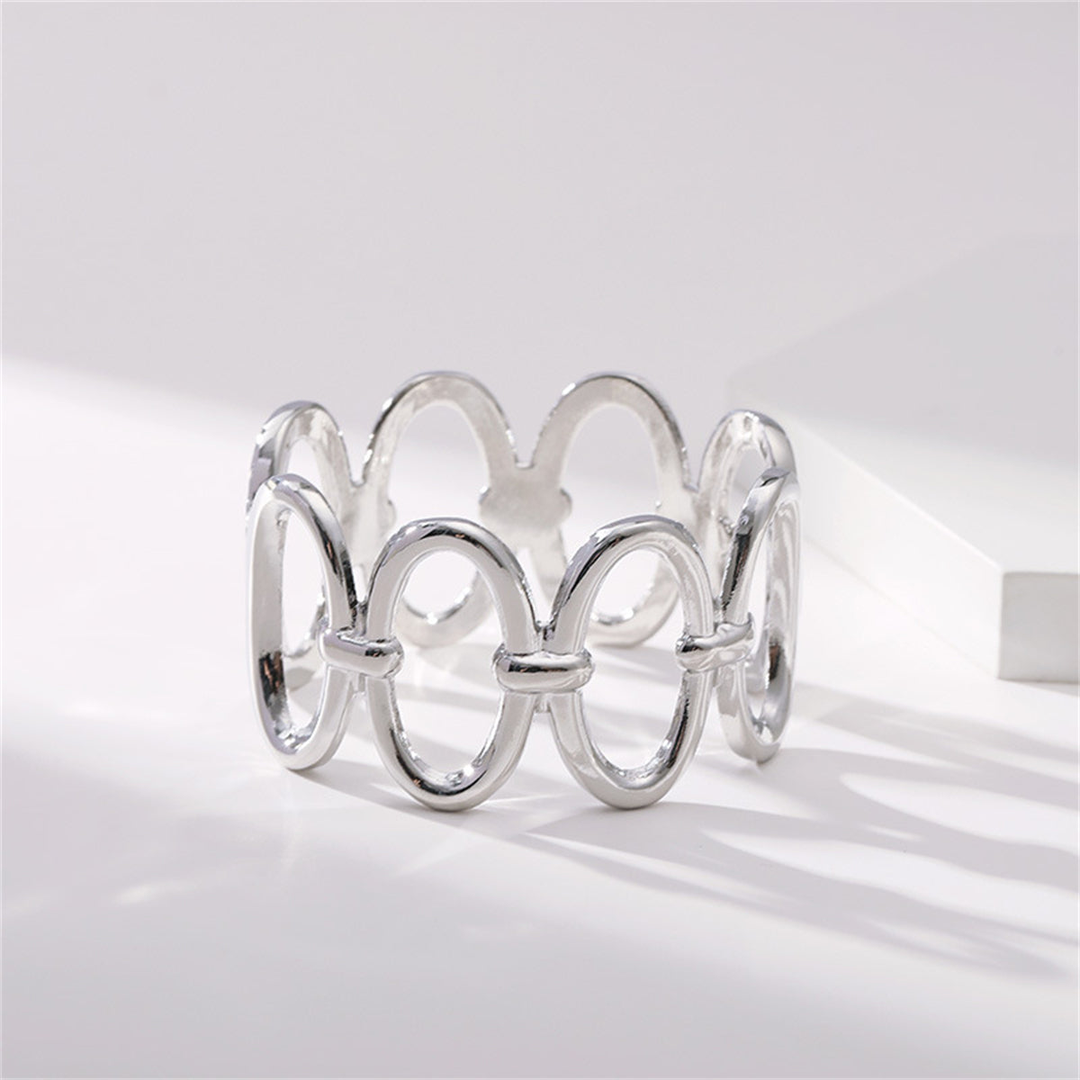 Silver-Plated Oval Station Bangle, silver bangle bracelet, botanical inspired, detail close-up
