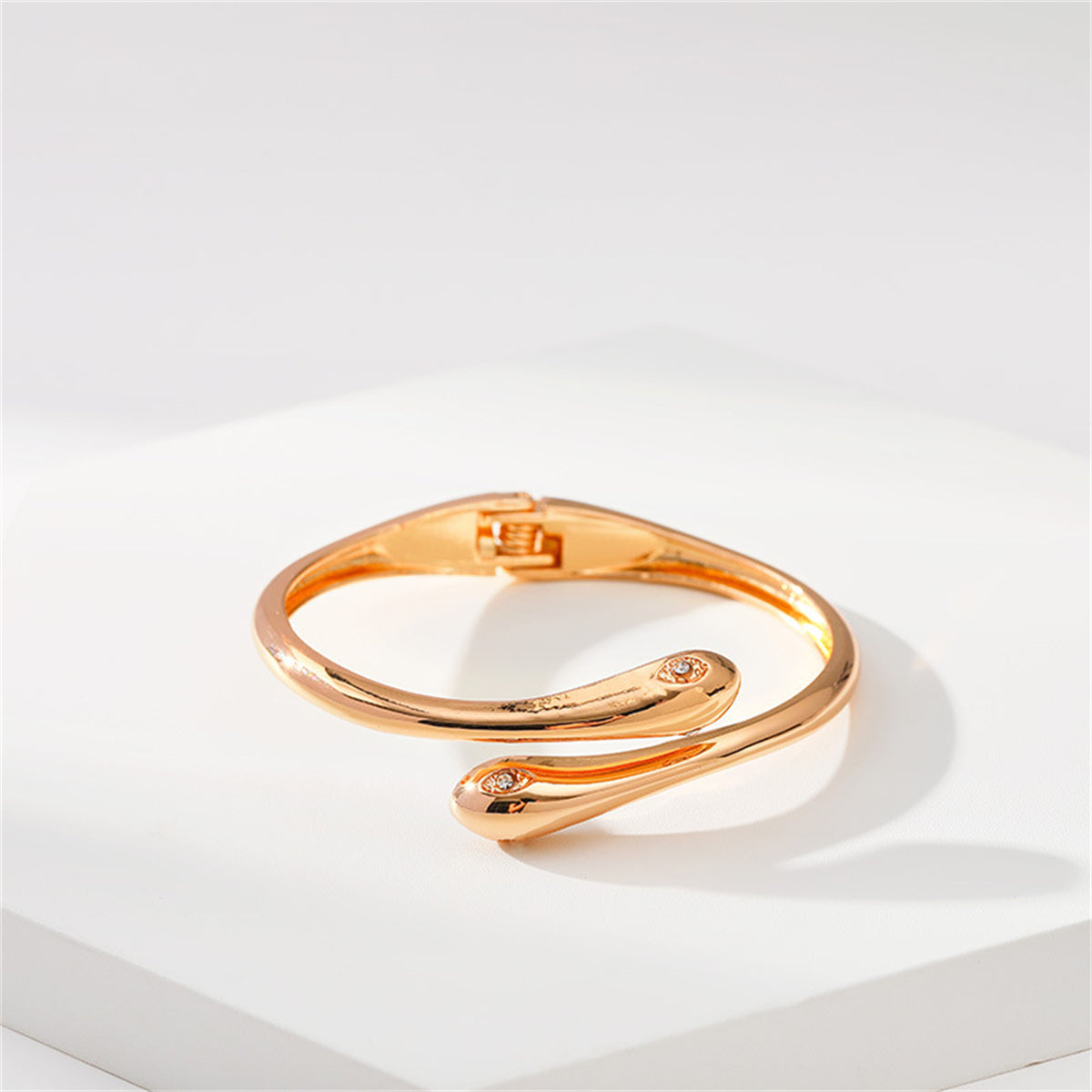 Cubic Zirconia and 18K Gold-Plated Double Snakes Hinge Bypass Bangle, gold bangle bracelet, detail close-up