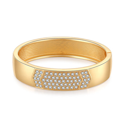 Cubic Zirconia and 18K Gold-Plated Arrow Bangle, gold bangle bracelet, vintage-inspired design, front view