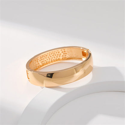 Cubic Zirconia and 18K Gold-Plated Arrow Bangle, gold bangle bracelet, vintage-inspired design, styled look