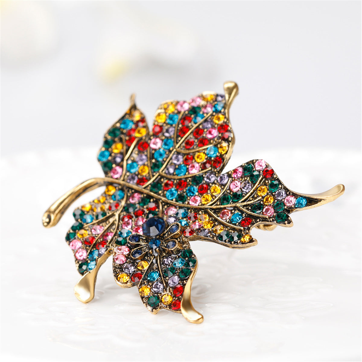 Red Multicolor Cubic Zirconia and 18K Gold-Plated Maple Leaf Brooch, gold brooch pin, botanical inspired, detail close-up