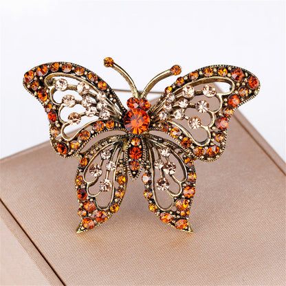Orange Cubic Zirconia and 18K Gold-Plated Butterfly Brooch, gold brooch pin, vintage-inspired design, lifestyle look