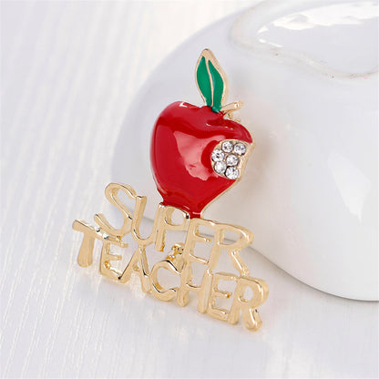 Cubic Zirconia and Enamel 18K Gold-Plated 'Super Teacher' Apple Brooch, gold brooch pin, everyday style, detail close-up
