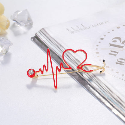 Cubic Zirconia and Enamel 18K Gold-Plated Stethoscope Heartbeat Brooch, gold brooch pin, vintage-inspired design, front view